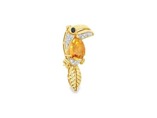 Toucan motif brooch in 18k yellow gold ,featuring a pear  yellow citrin,saphire and diamond accents